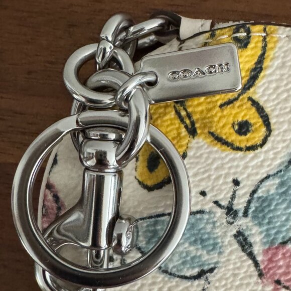 COACH - Circular Coin Pouch With Butterfly Print - Picture 12 of 13